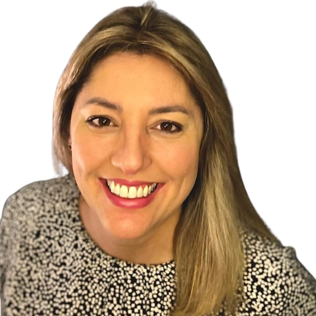 Smiling woman with blonde hair and patterned shirt