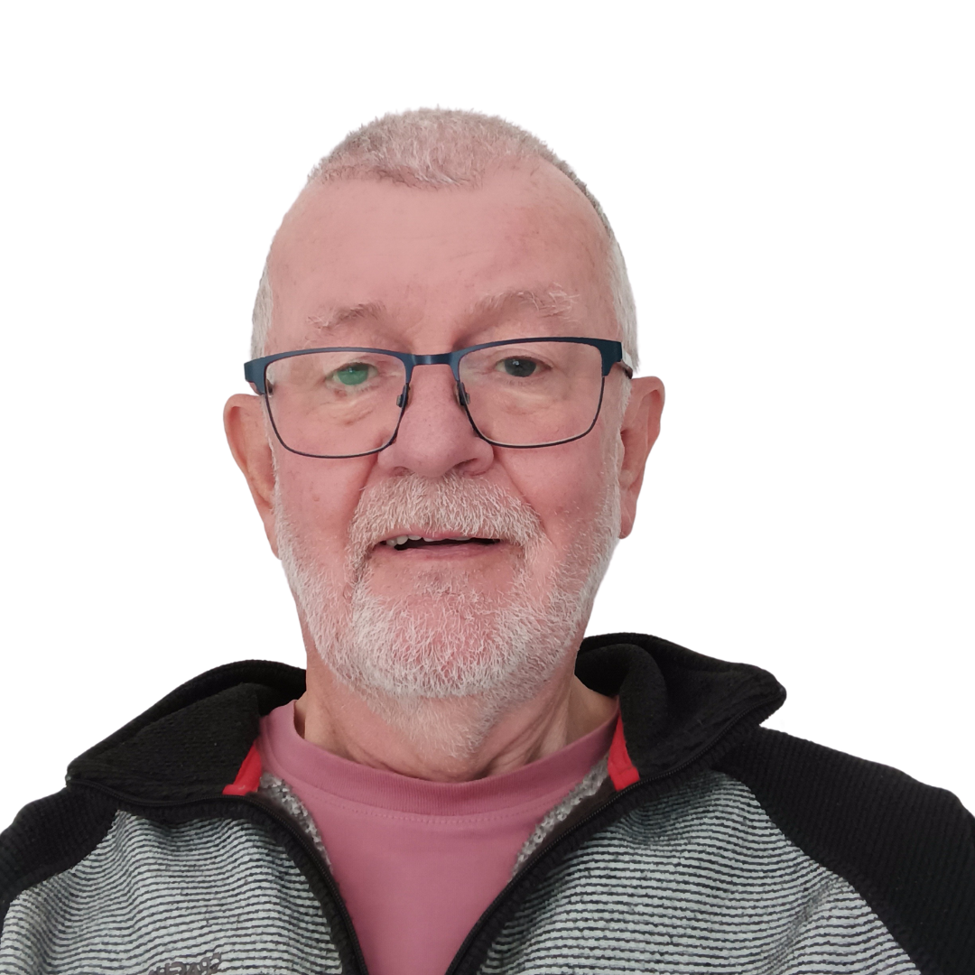 Smiling elderly man with glasses and gray beard