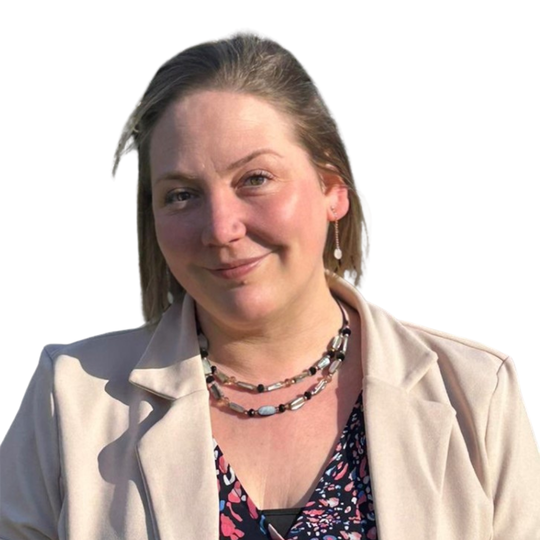 Smiling woman in beige blazer outdoors