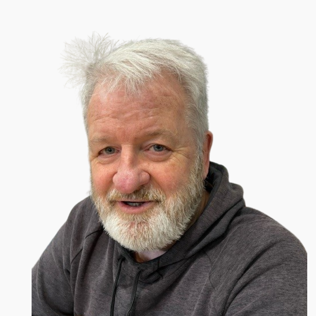 Smiling older man with gray hair and beard