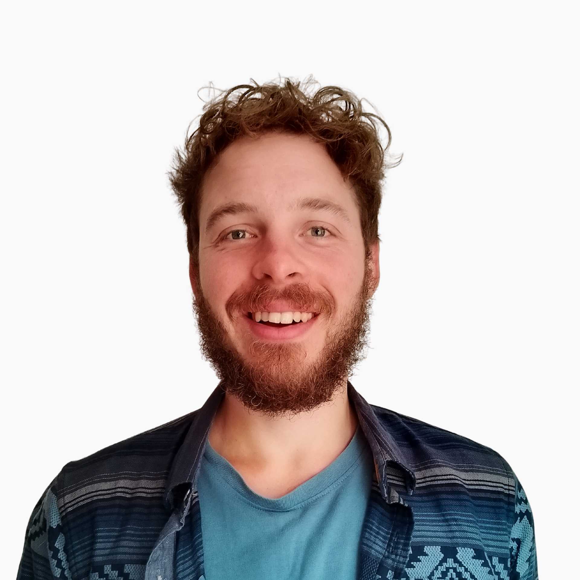 Smiling man with beard in casual shirt